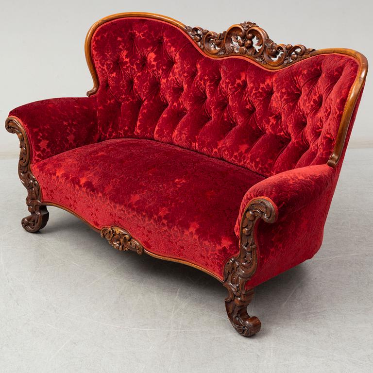 A later part of the 19th century Rococo style sofa.