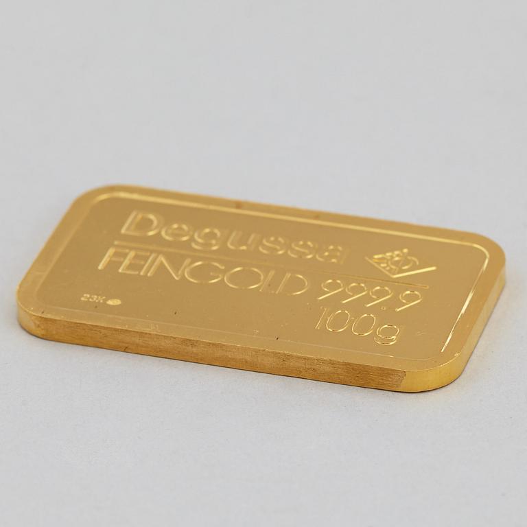 GULDTACKA, Degussa 23K, 100 gram.