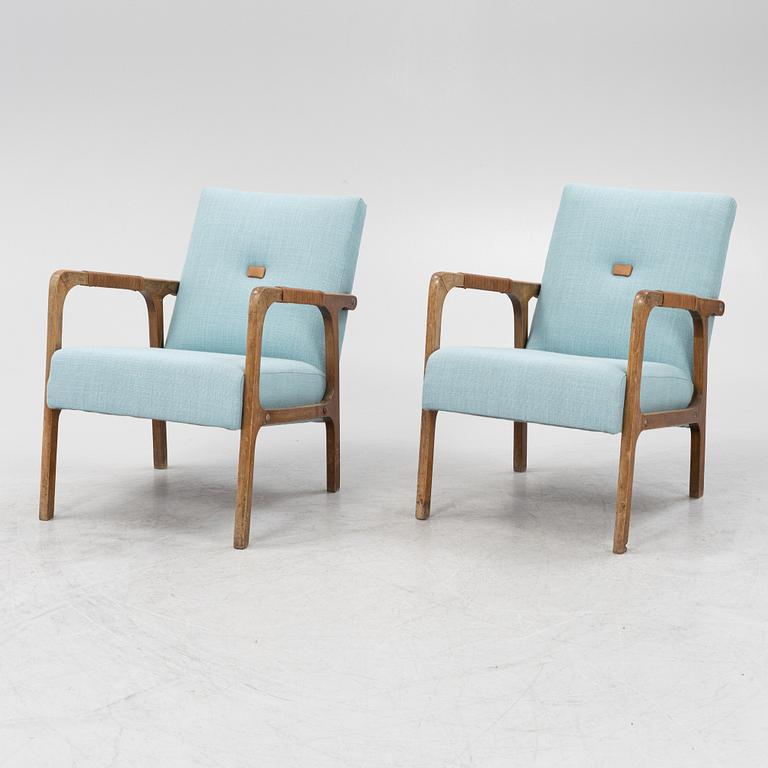 a pair of 1950's armchairs.