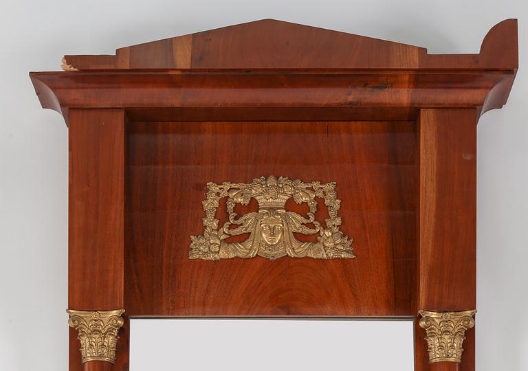 A MIRROR AND CONSOLE TABLE, Empire, Sweden, early 19th century.