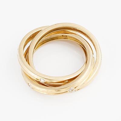 A brilliant-cut diamond "Trinity" Cartier ring.