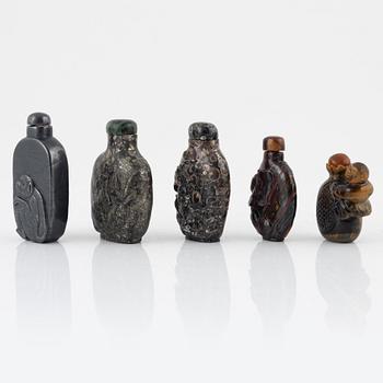 Ten snuff bottles, mottled stone, China, 20th century.