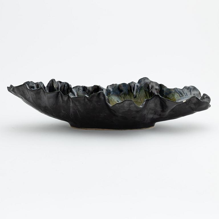 Pol Chambost, a glazed ceramic leaf shaped bowl or dish, signed.
