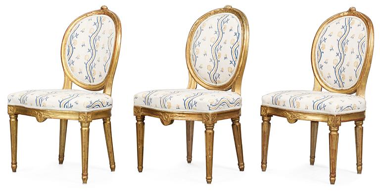 Three matched Gustavian chairs.