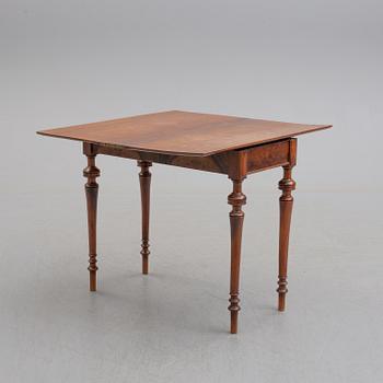 A late 19th century mahogany card table.