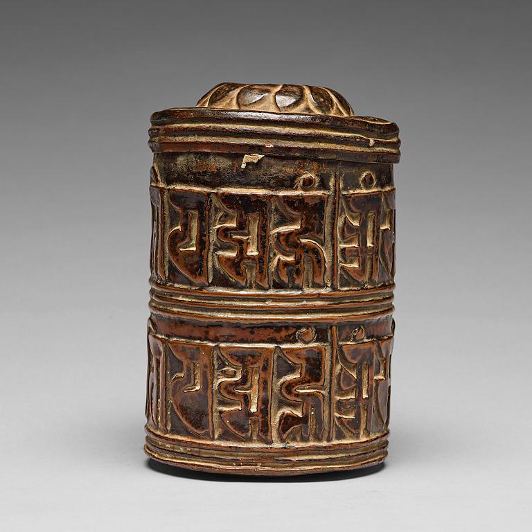 BÖNERULLE, kopparlegering. Tibet, 17/1800-tal.