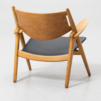Hans J. Wegner, Armchair, “CH-28”, Carl Hansen & Søn, Denmark, second half of the 20th century.