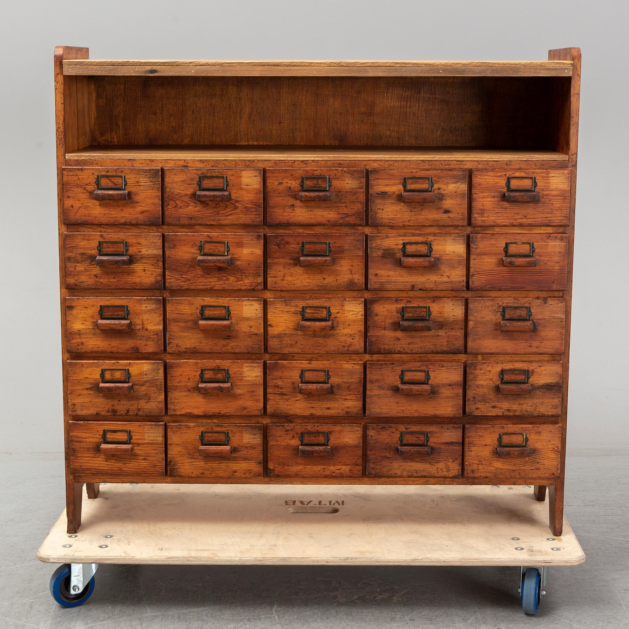 A circa 1900 chest of 20 drawers.