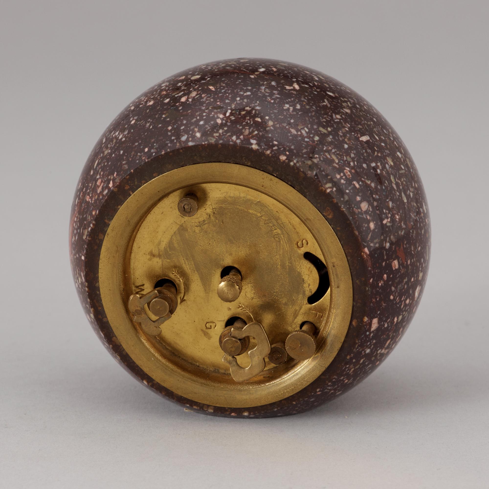 A Swedish early 20th century porphyry alarm clock.