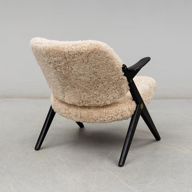 A 1950's 'Triva' easy chair by Bengt Ruda, from Nordiska Kompaniet.