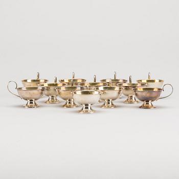 12 1960's silver punch cups. App. 400 gram.