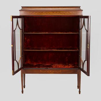 An English display cabinet, first half of the 20th century.