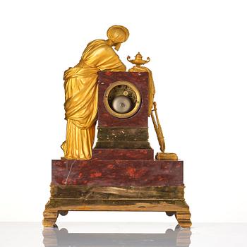 A French Empire ormolu and marble mantel clock 'à la sultane', first part of the 19th century.