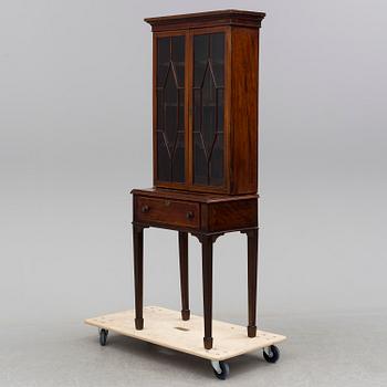 A mahogany cabinet, England, late 19th / early 20th century.