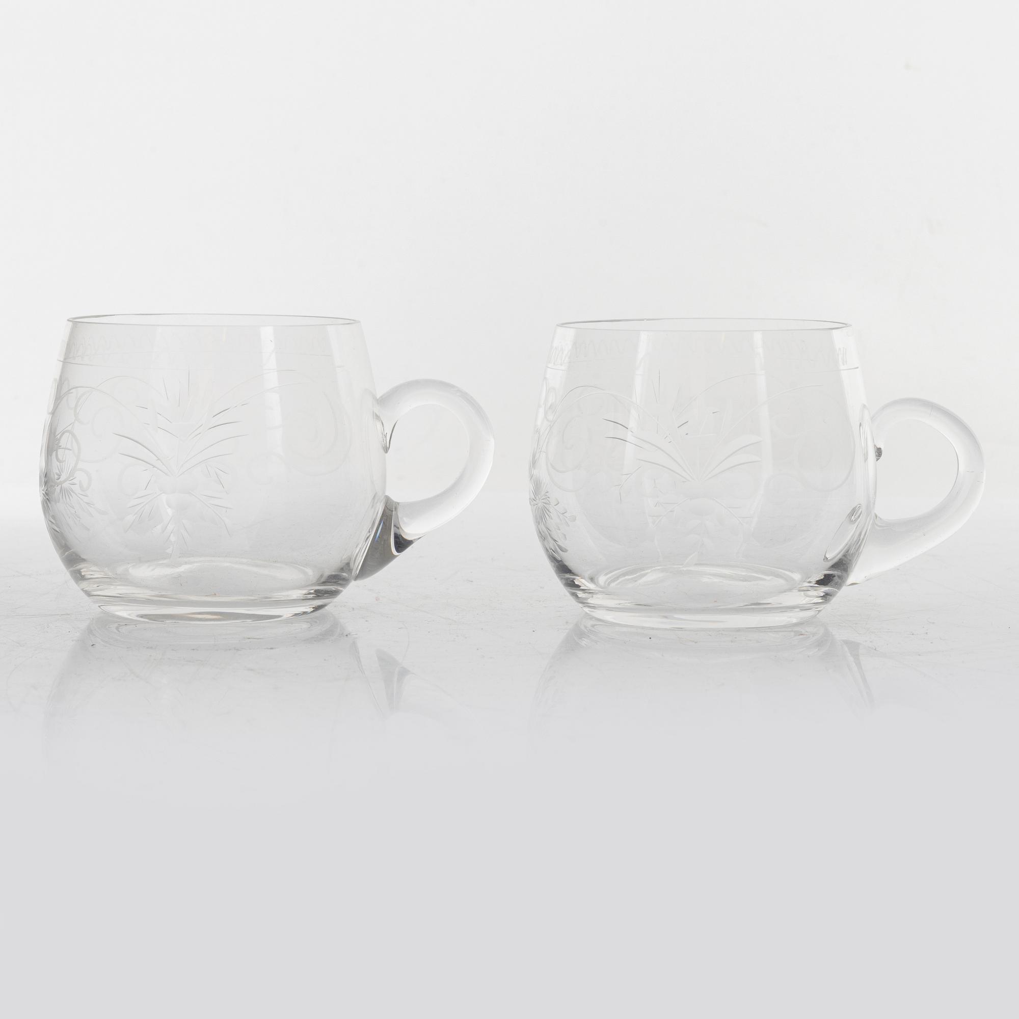 A punch bowl and mugs, glass, mid 20th century.