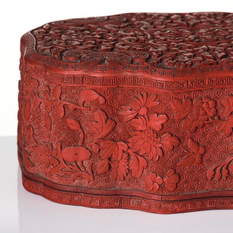 A fine carved lacquer box and cover with tianqi lacquer inset boxes and covers, Qing dynasty, Qianlong (1736-95).