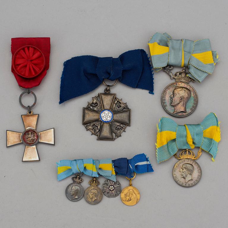 Five medals, two Orders of the Lion of Finland and one Order of the White Rose of Finland.