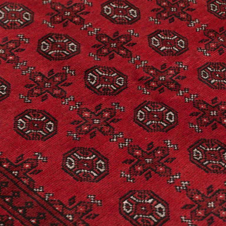 An orietal rug, around 250 x 163 cm.