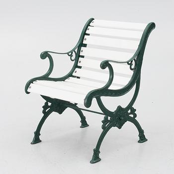 Garden bench, armchair and table, 20th century.