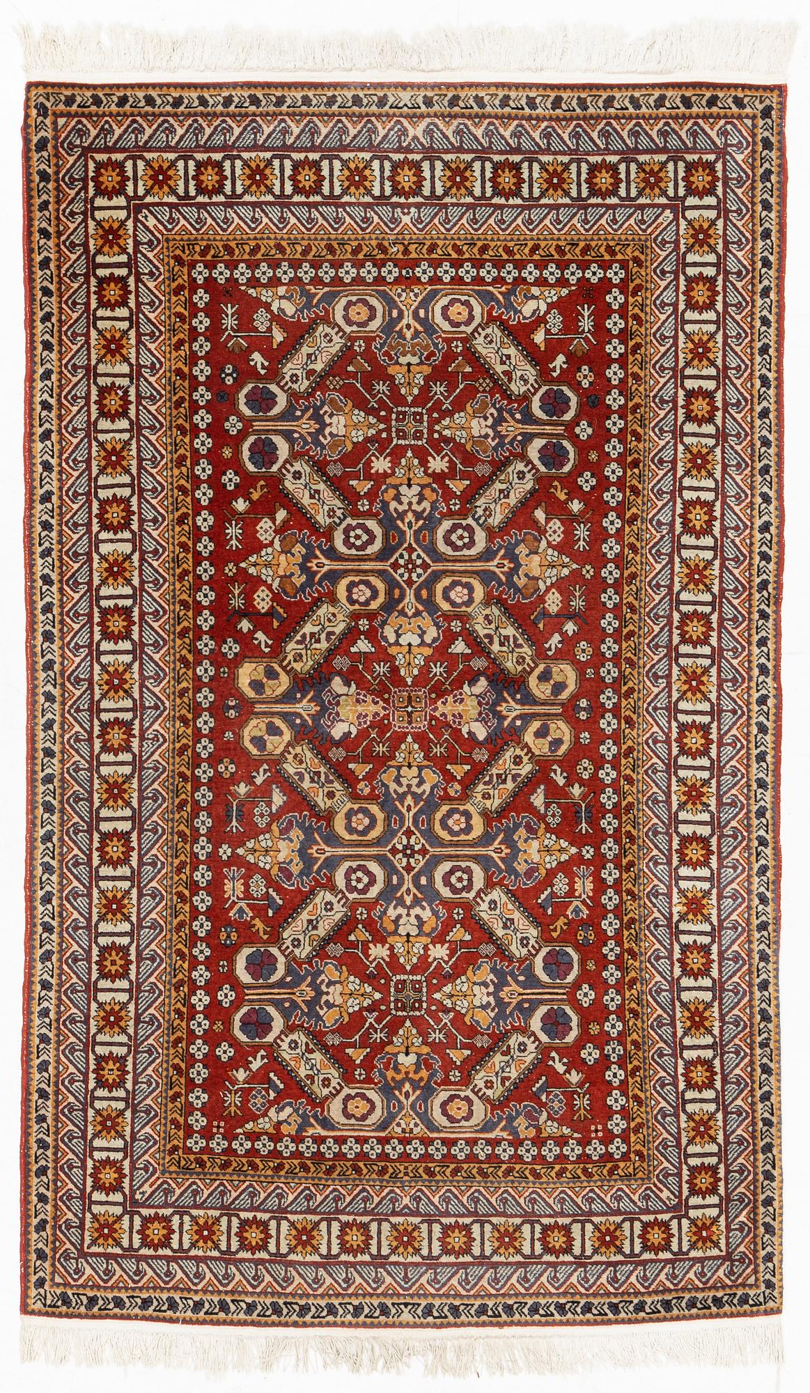 A rug, 215 x 130 cm.