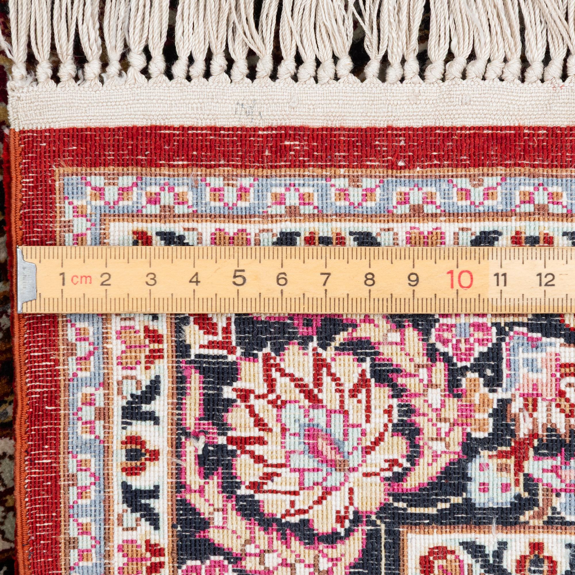 Carpet, silk, approx. 95 x 63 cm.