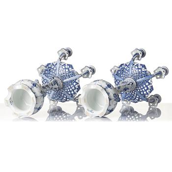 A pair of Royal Copenhagen 'Musselmalet' / 'blue fluted full lace' six-light candelabras, Denmark, 1898-1923.