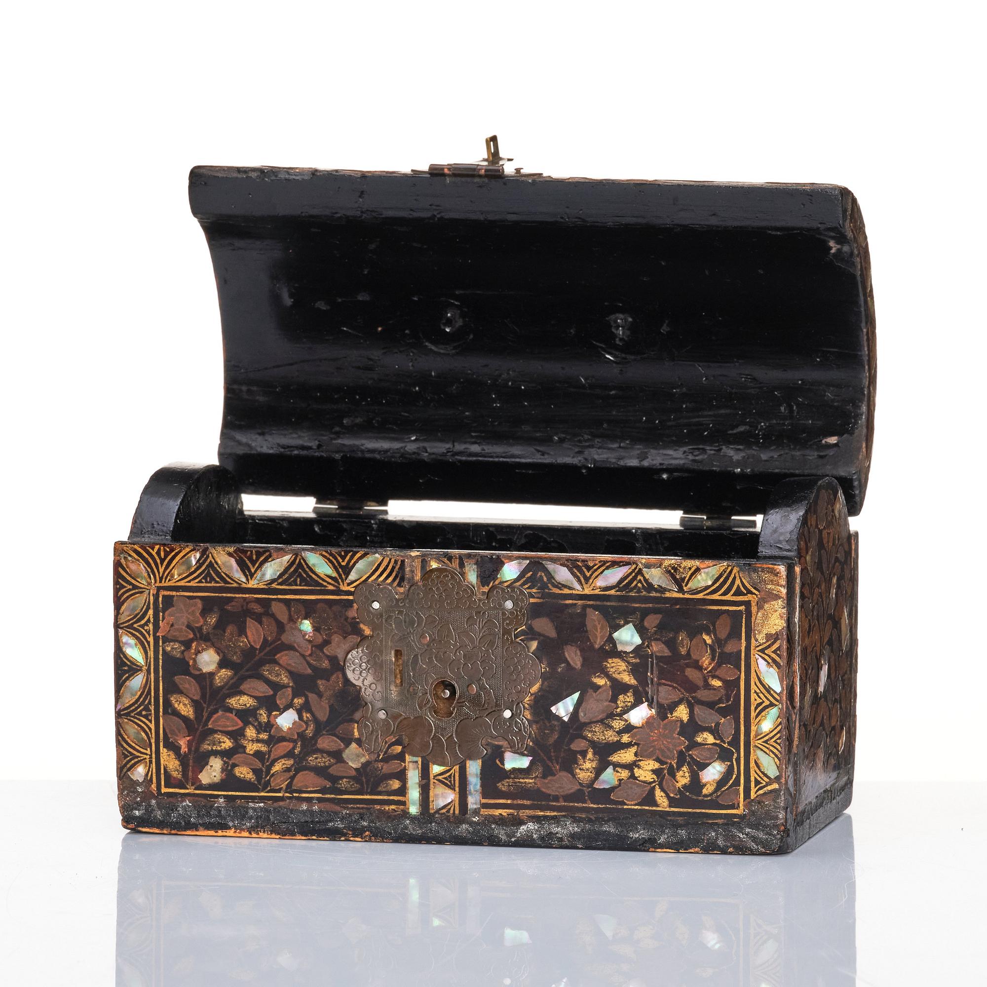 A Japanese lacquer casket/Namban chest, commissioned by the Portuguese, Edo period (1603-1868).