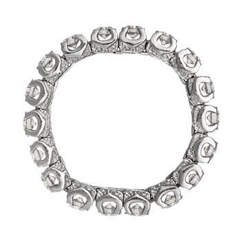 A CHAIN RING, 14K white gold. Brilliant cut diamonds c. 1.10 ct. Size 17,5. Weight 4,3 g.