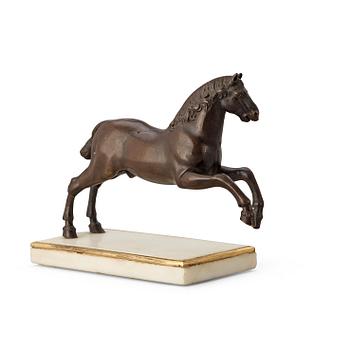 A Baroque 17th century bronze figure of a horse.