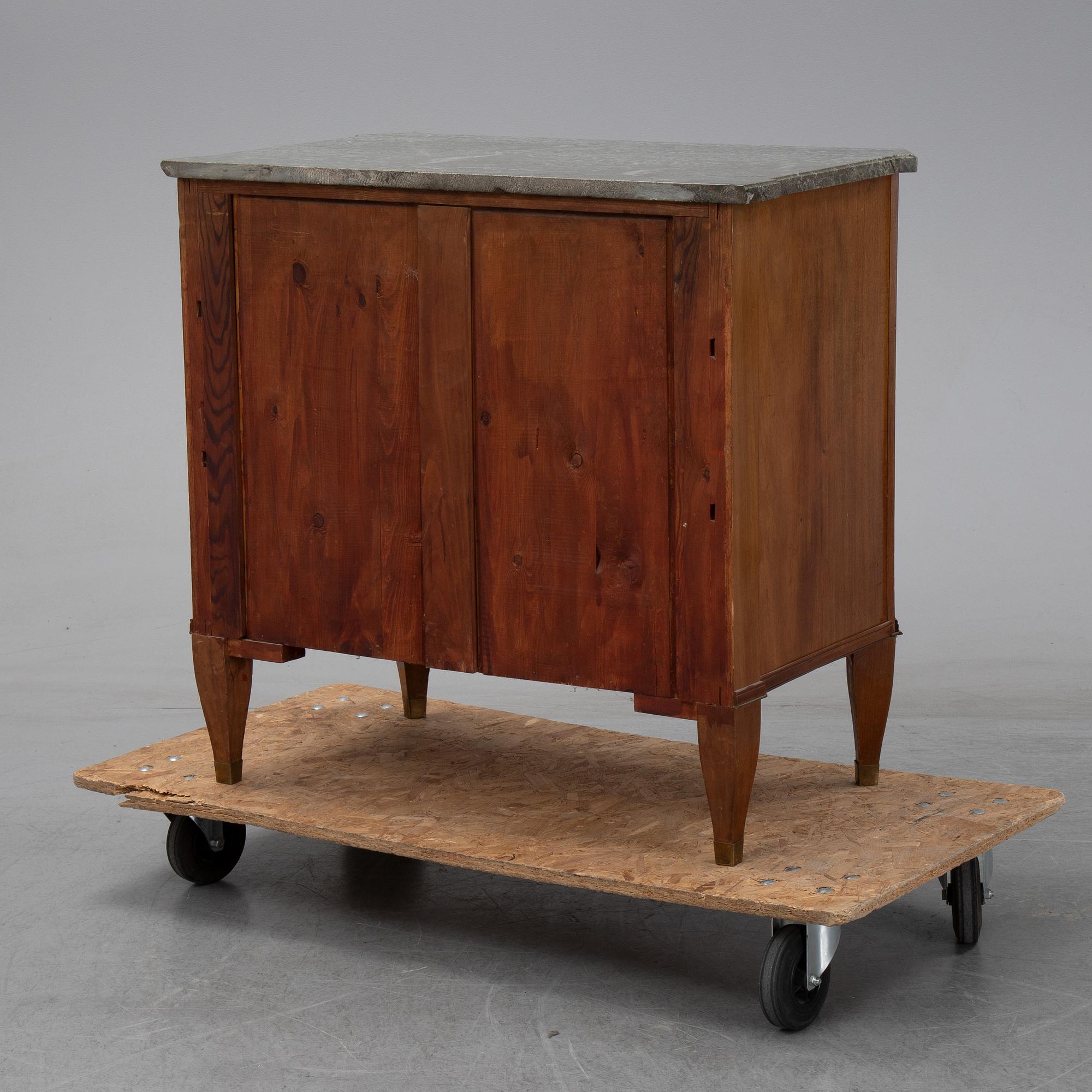 A gustavian style chest of drawers from the second half of the 20th century.
