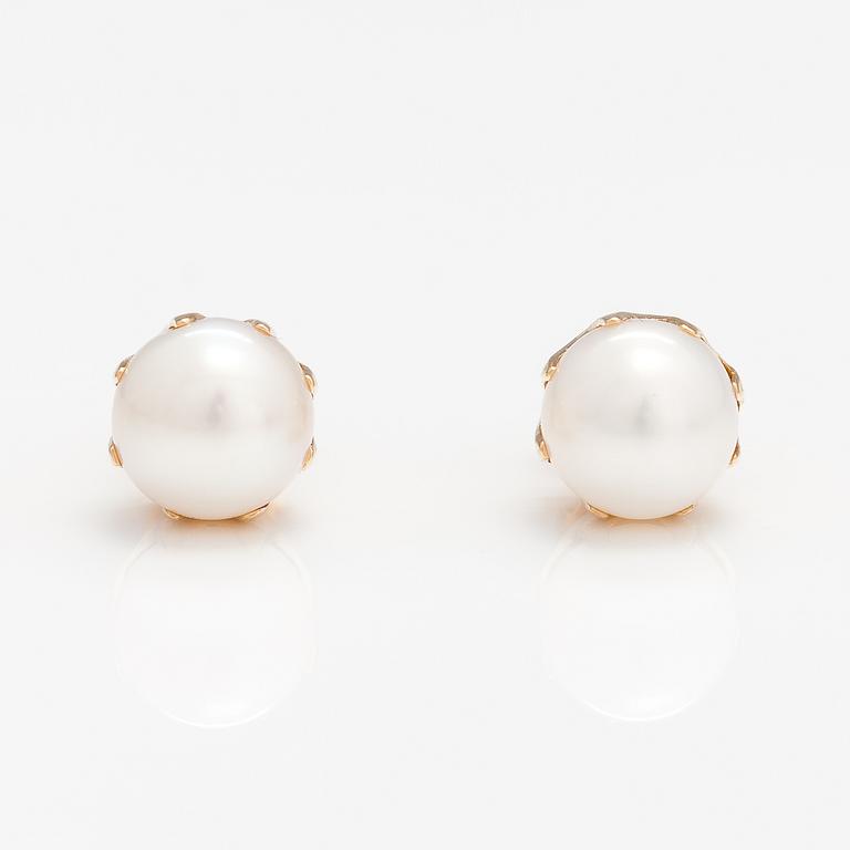 A pair of 14K gold earrings with cultured pearls.