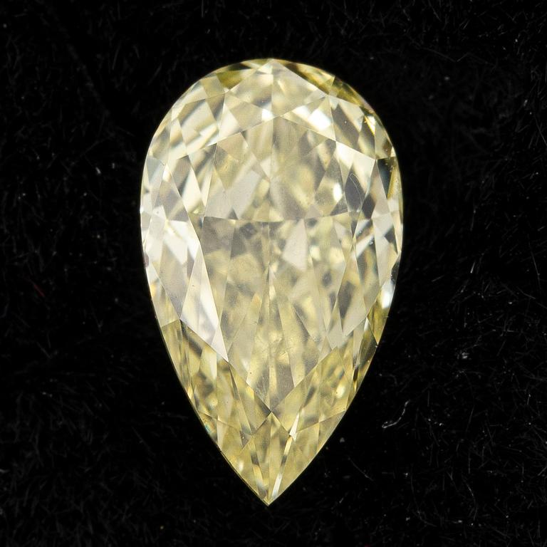 Oinfattad droppslipad gul diamant, 0.50 ct, medföljande GIA report.