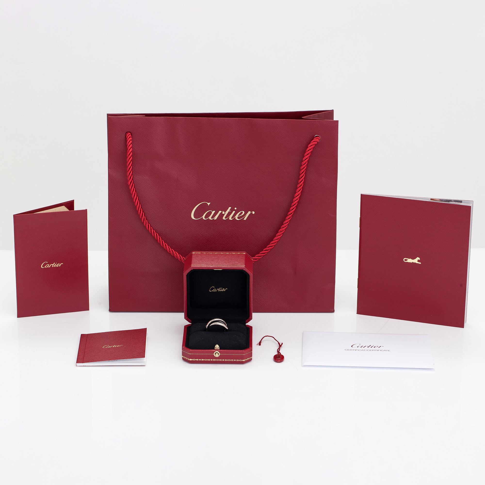 Cartier, An 18K white gold a ceramic ring "Trinity". Marked Cartier, JQV623.