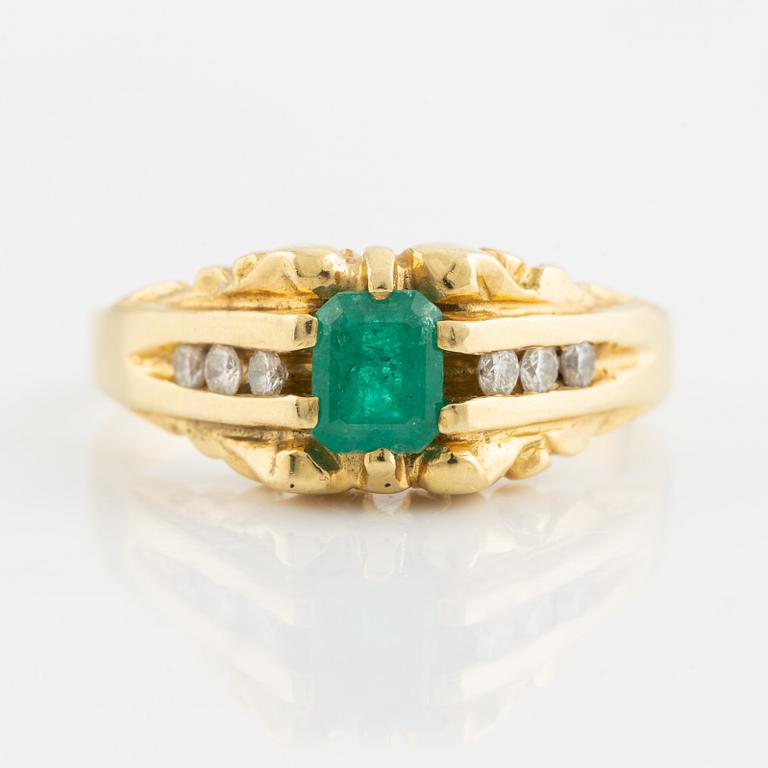 Emerald and brilliant cut diamond ring.