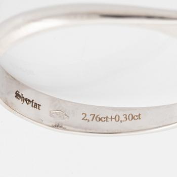 Morganite and brilliant cut diamond ring.