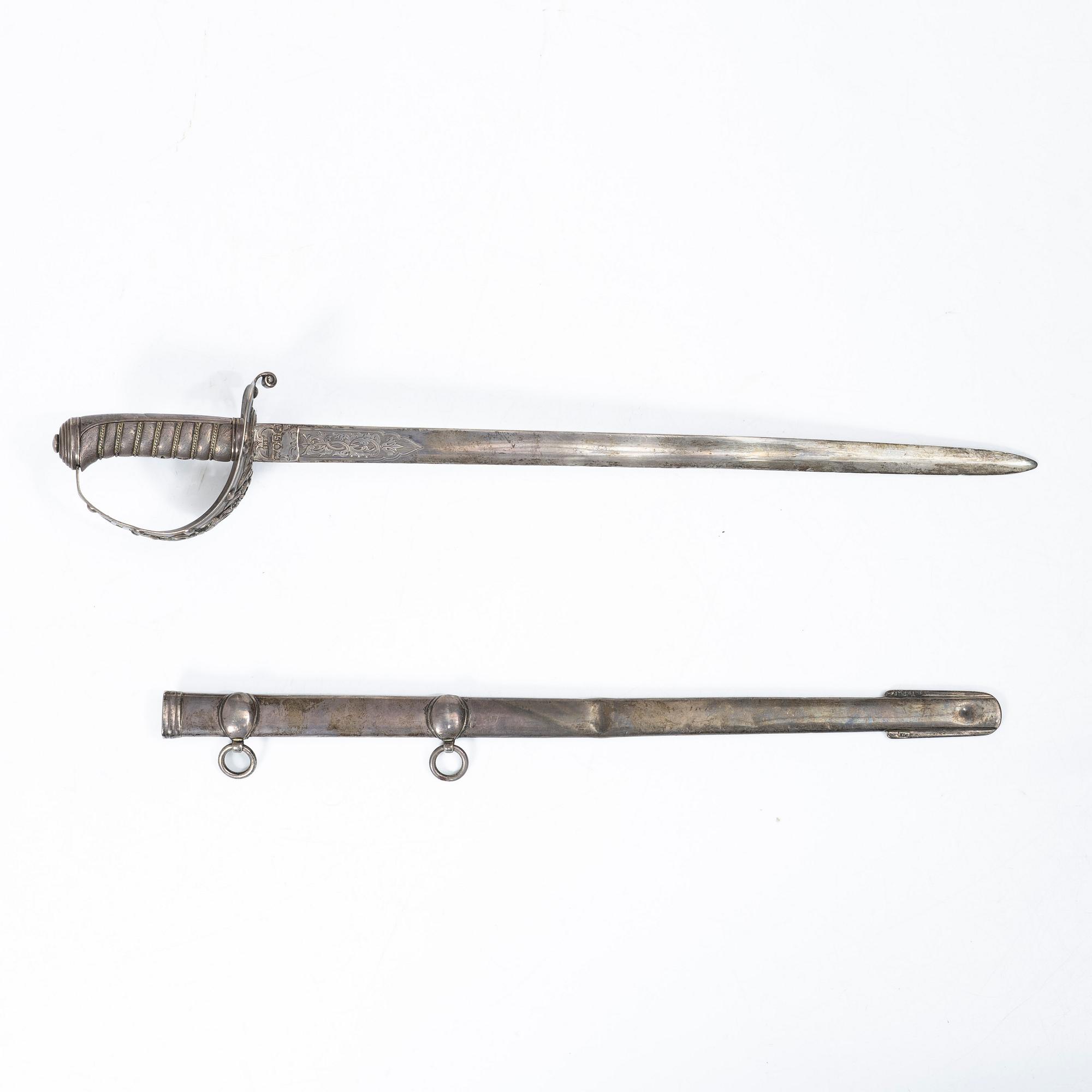 Edward H Stockwell, brevkniv i form av värja, silver, London 1873.