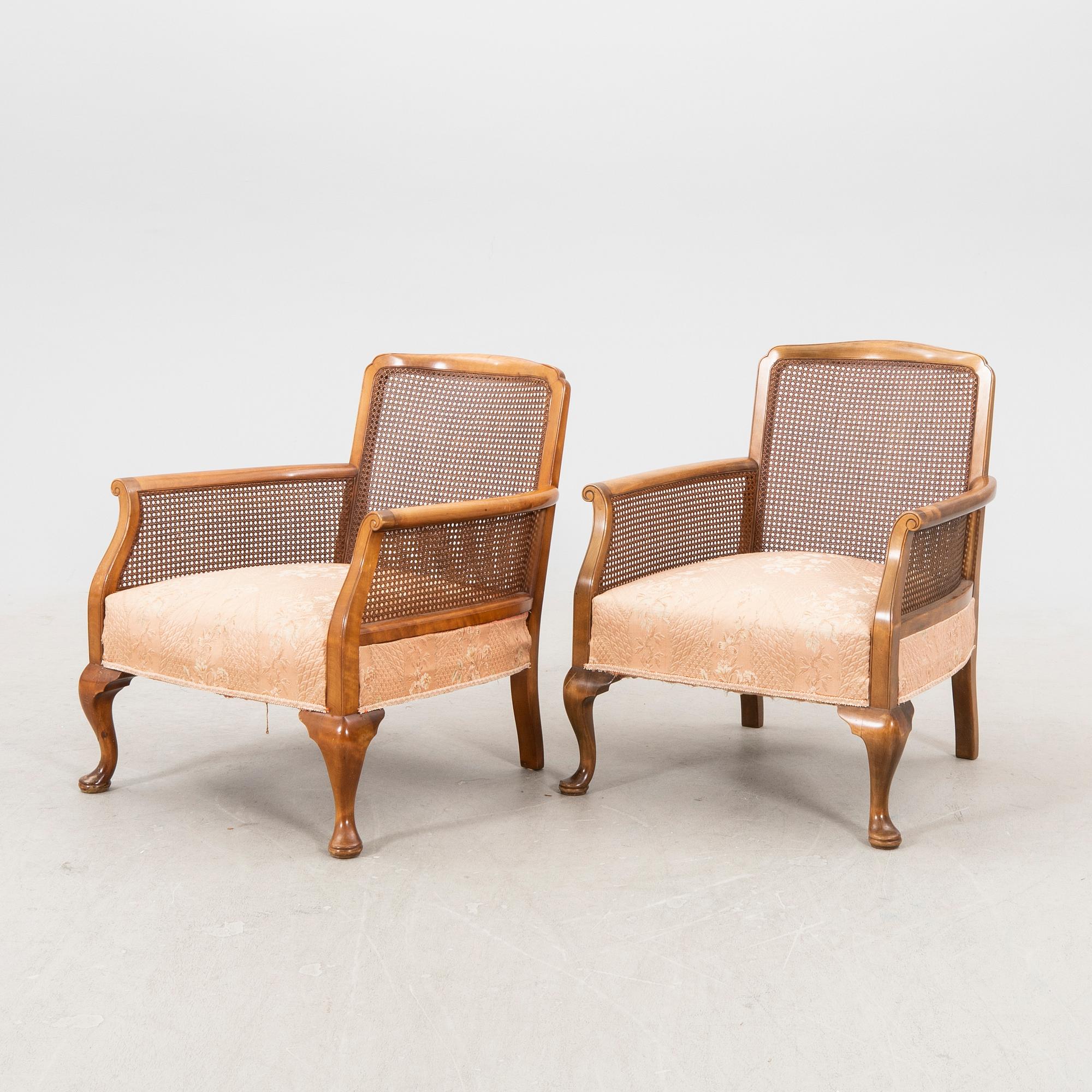 A pair of 1940/50s armchairs.