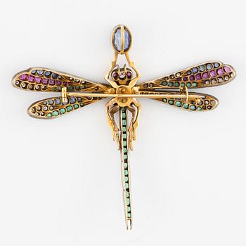 A brooch/pendant  in the form of a dragonfly with emeralds, rubies, sapphires and diamonds, Russia 1899-1908.