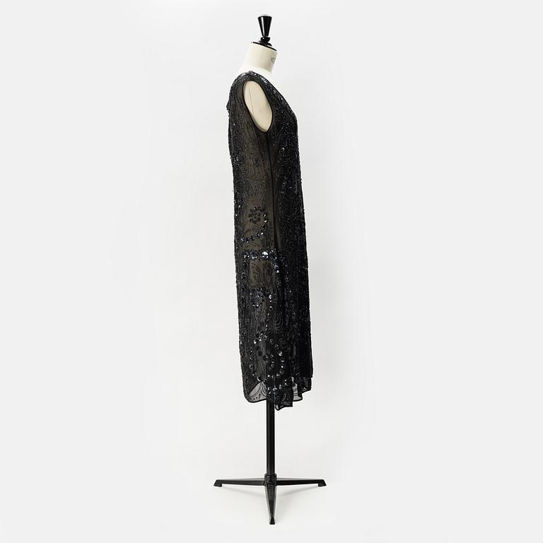 A pearl and sequin embroidered 1920's dress.