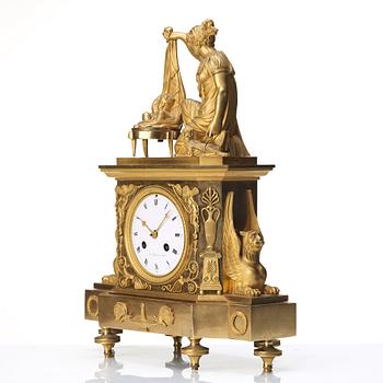 A Empire early 19th century gilt bronze mantel clock.