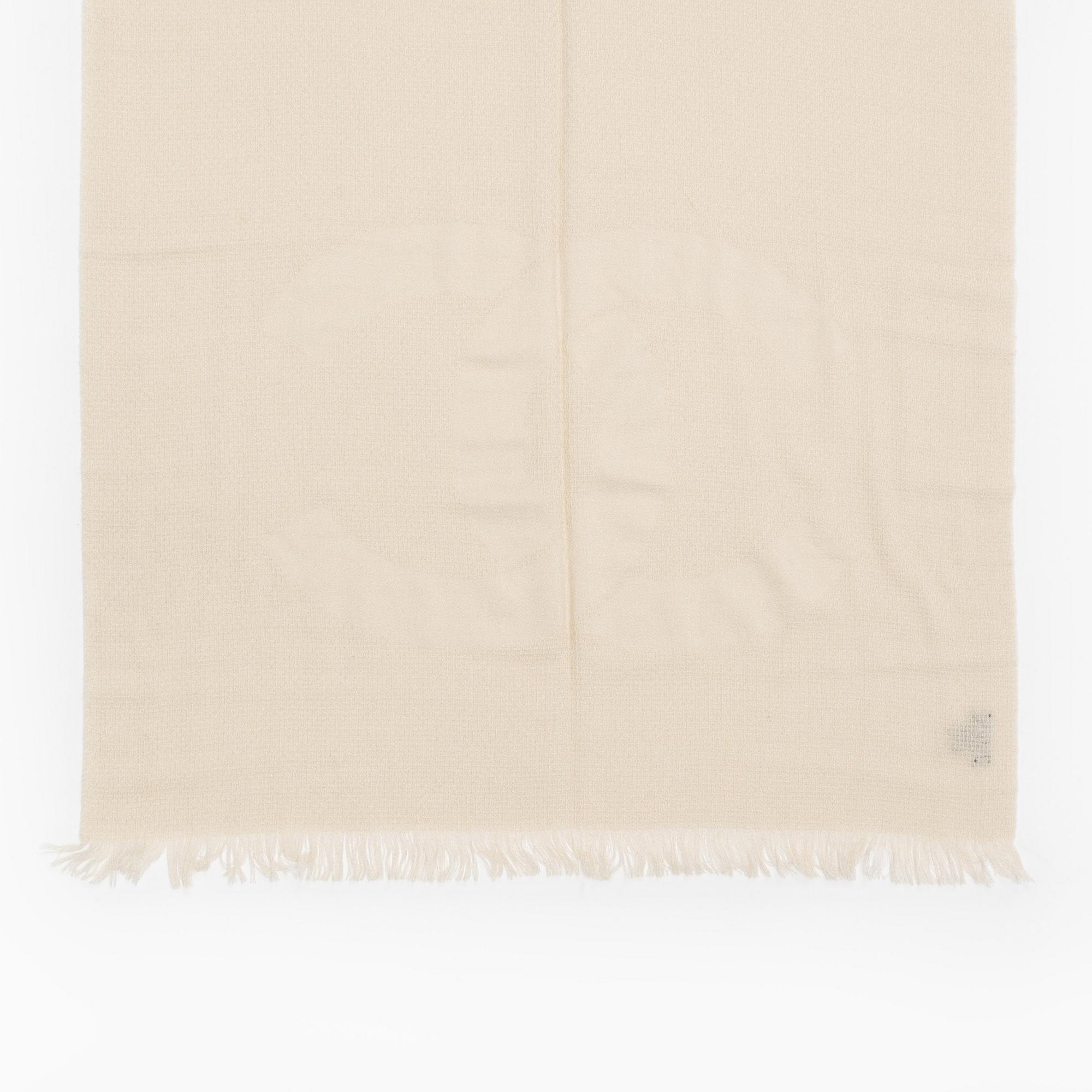 Chanel, a cashmere and silk-mix shawl.