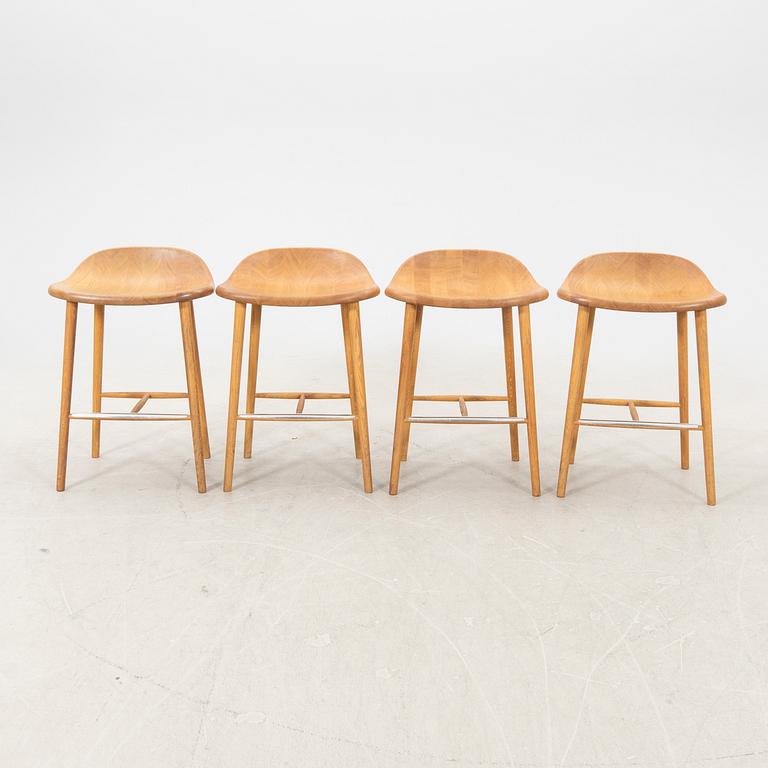 Jonas Lindvall, a set of four Miss Holly oak bar stools 21st century.