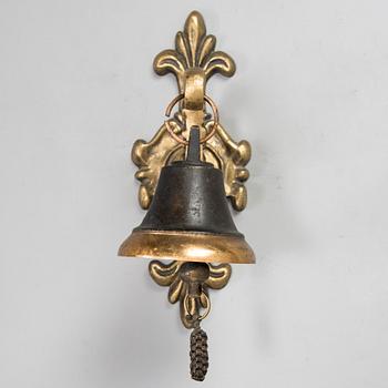 A bronze Ship's Bell mounted on wall bracket, from second half of the 20th century.