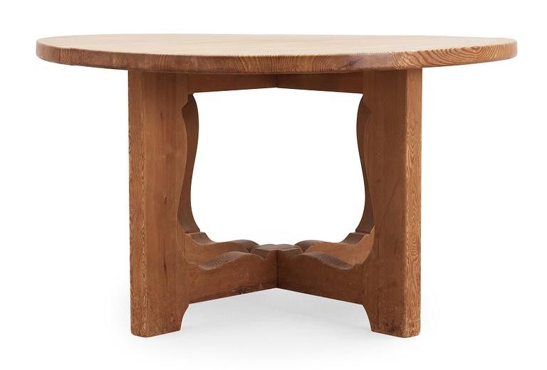 A stained pine dining table, attributed to Axel Einar Hjorth, Nordiska Kompaniet, 1930's.
