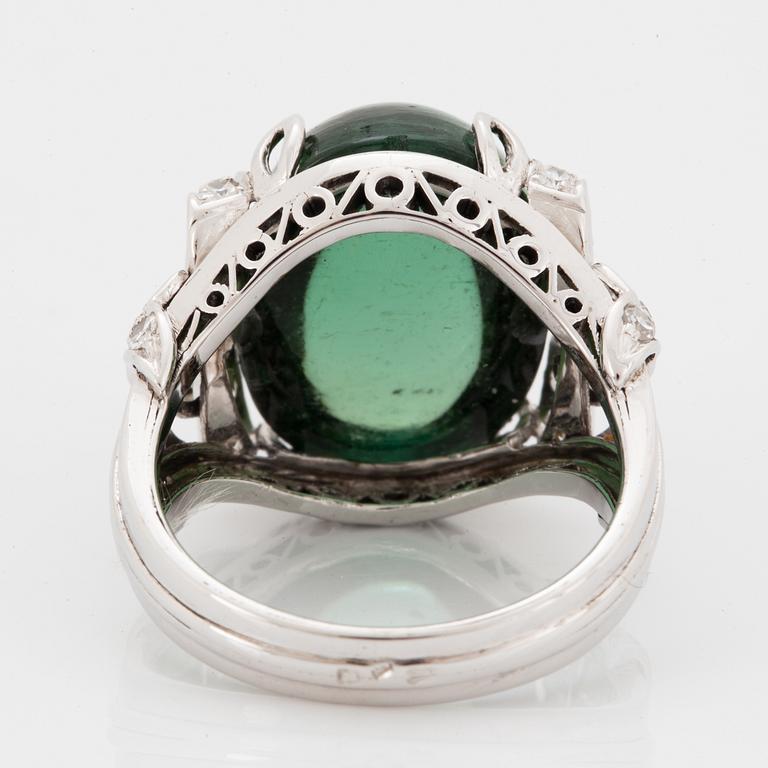 18K white gold diamond and green cabochon-cut tourmaline cocktail ring.