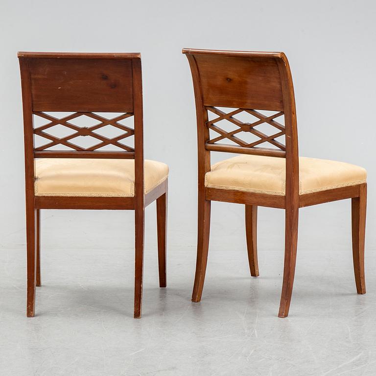 A set of four empire style mahogany chairs, first half of the 20th Century.