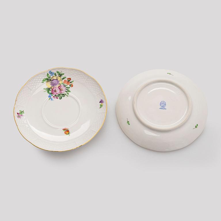 A pair of Herend porcelain candlesticks, and a lidded sugar bowl, Hungary.