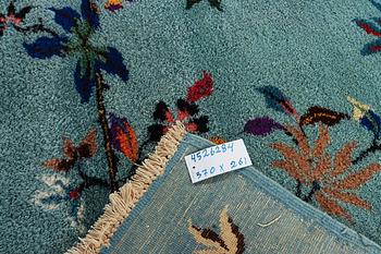 An oriental carpet, a. 370 x 261 cm.