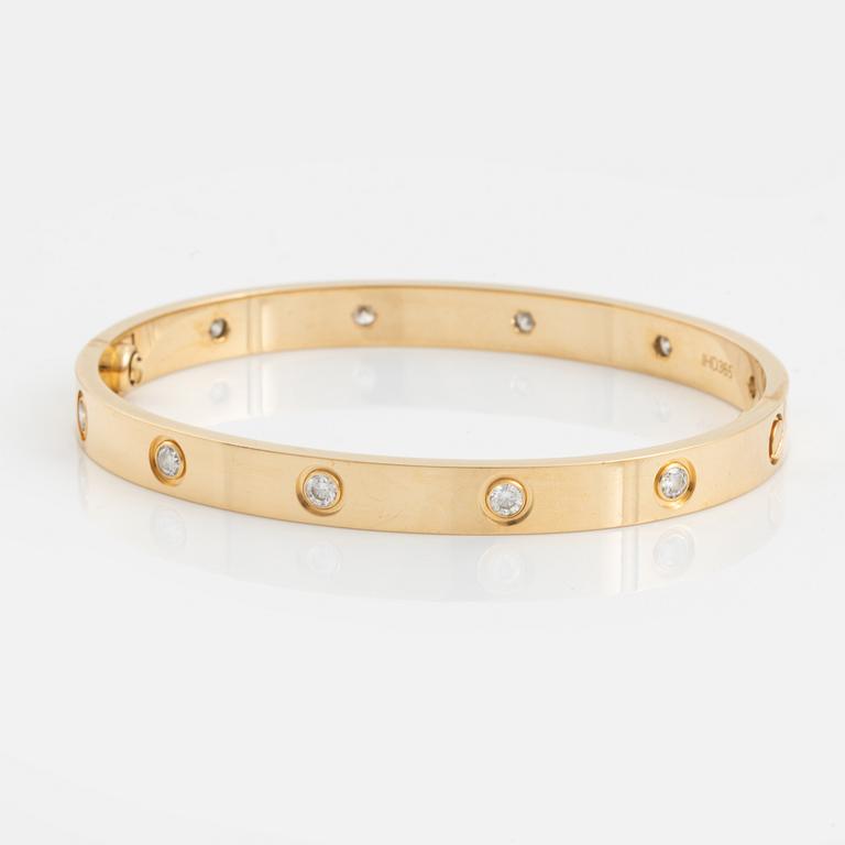 Cartier "Love" armband 18K guld med tio runda briljantslipade diamanter.