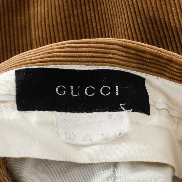 BYXA, Gucci.